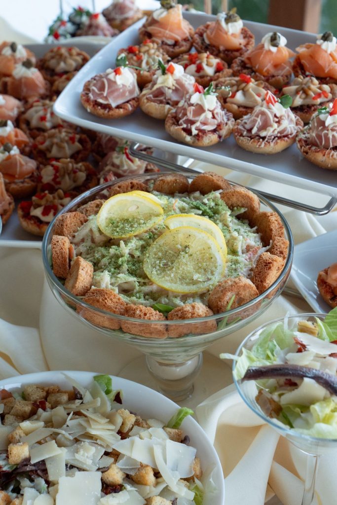 Canapés and salads at a buffet for a corporate event
