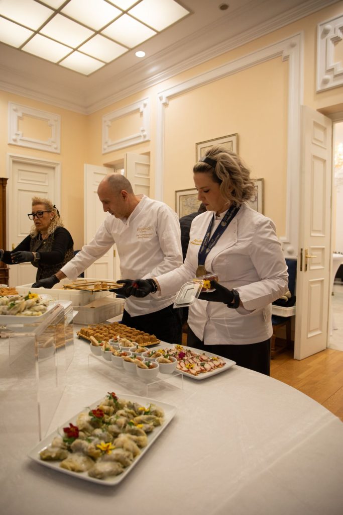 Cernica Events chefs serving at an off-site event